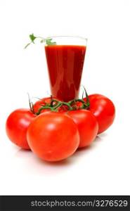 Tall glass of tomato juice and fresh red tomatoes on a white background. Tomato Juice And Fresh Tomatoes