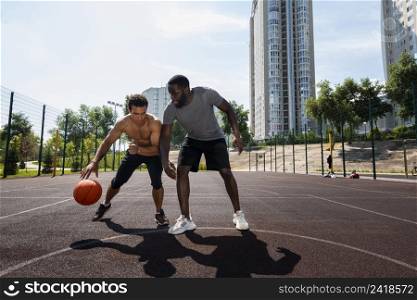 tall men playing urban basketball