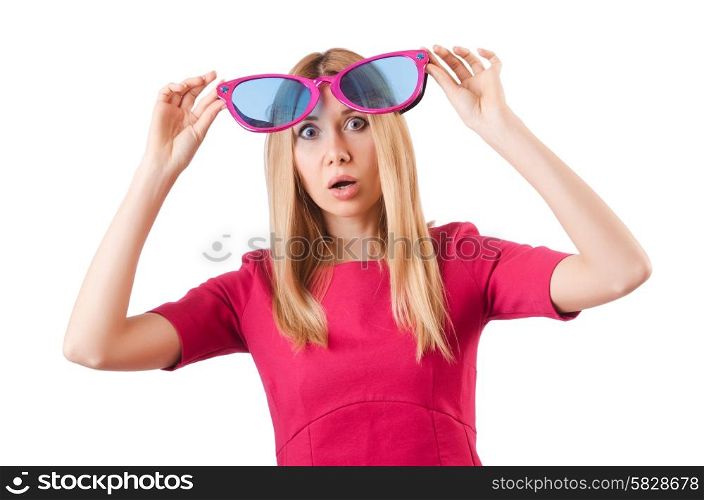 Tall model with giant sunglasses on white