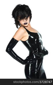 Tall slender woman dressed in black latex