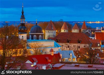 Tallinn. Aerial view of the city at sunset.. Aerial view of the city in the night illumination. Tallinn. Estonia.