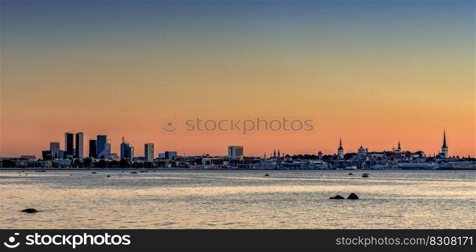 Tallinn, Estonia - 5 August, 2021  cityscape and skyline of Tallinn at sunset with colorful sky and copy space