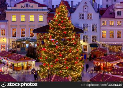 Tallinn. Town Hall Square at Christmas.. Christmas Fair and Christmas tree on the Town Hall Square. Tallinn. Estonia.