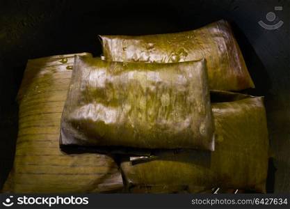 Tamale Mexican food recipe with banana leaves steamed
