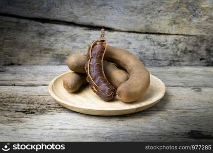 tamarind on grunge wooden background