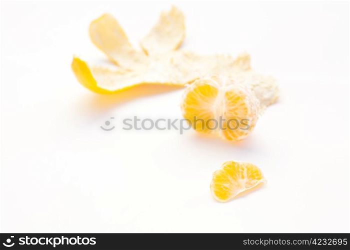 tangerine and his skin on a white background