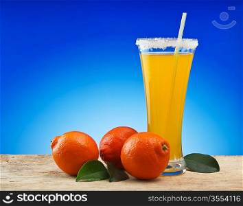 tangerine and juice on a table
