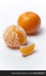 Tangerine, peeled and with a cut