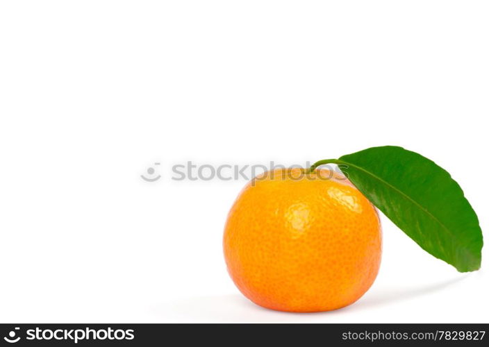 Tangerine with green leaves isolated on white