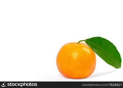 Tangerine with green leaves isolated on white