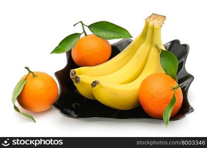 Tangerines and banana in plate isolated on white background