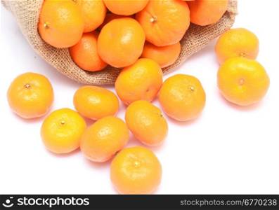 tangerines and sack isolated on white background