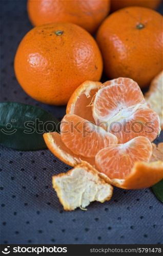 tangerines. Ripe tangerines on wooden background