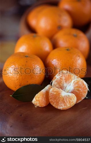 tangerines. Ripe tangerines on wooden background