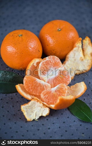 tangerines. Ripe tangerines on wooden background