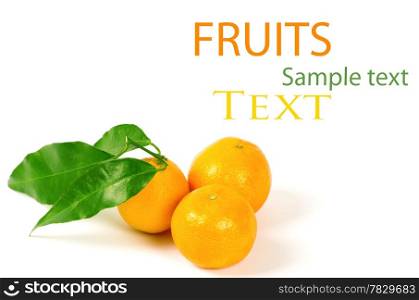Tangerines with green leaves isolated on white