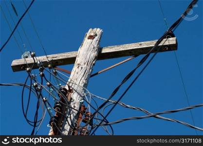 Tangled Wires at Top of Telephone Pole