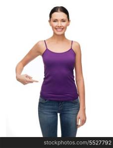 tank top design and gesture concept - smiling woman in blank purple tank top pointing her finger at herself