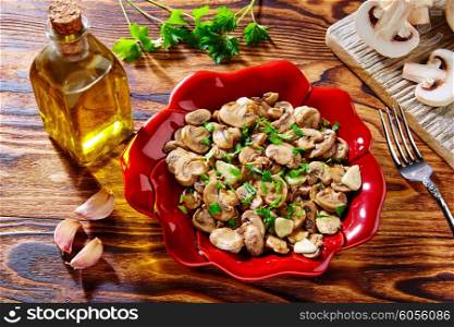 Tapas from Spain champinones garlic mushrooms with potatoes and sausage