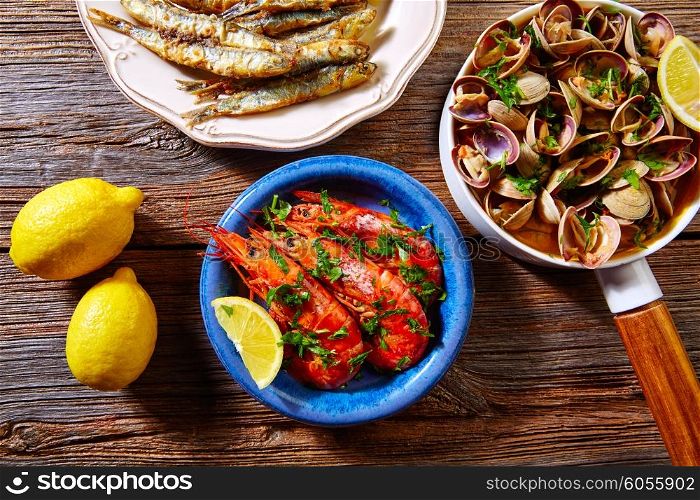 Tapas spanish seafood clams shrimps and fried anchovies fish