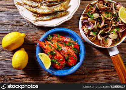 Tapas spanish seafood clams shrimps and fried anchovies fish