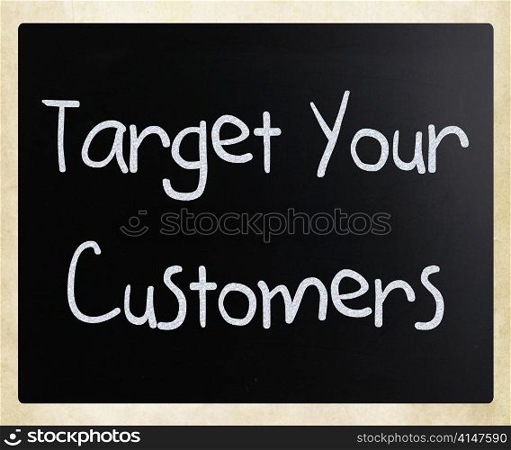 ""Target your customers" handwritten with white chalk on a blackboard"