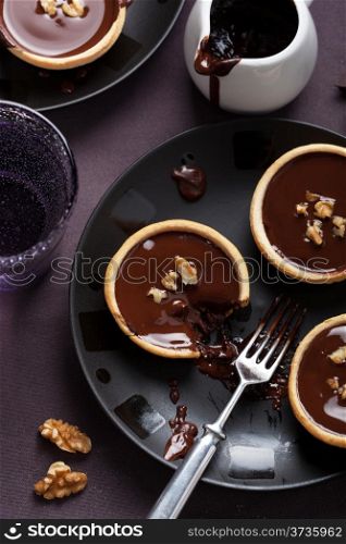 tartelettes with chocolate ganache and walnuts