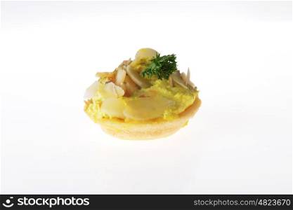 tartlet with cream, nuts and dill