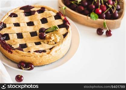 Tasty American cherry pie on white background. Top view. Copy space