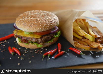 Tasty and appetizing hamburger with fries