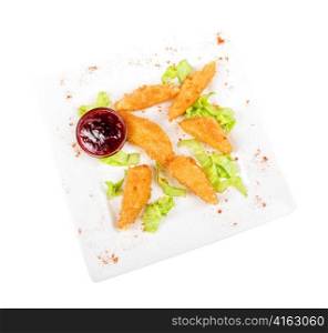 Tasty Baked cheese with cranberries sauce isolated on white