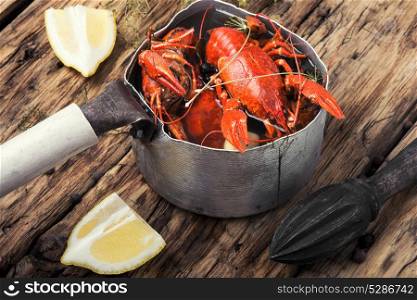 tasty boiled shellfish served in metal pot. shellfish in the pan