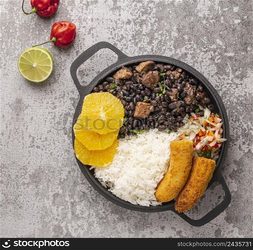 tasty brazilian dish with orange top view