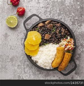 tasty brazilian dish with orange top view