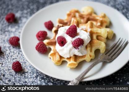 tasty breakfast - Belgian waffles with raspberries