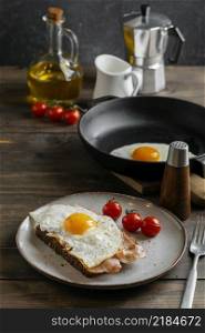 tasty breakfast with egg bacon high angle