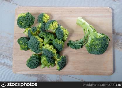 tasty broccoli on a wooden board