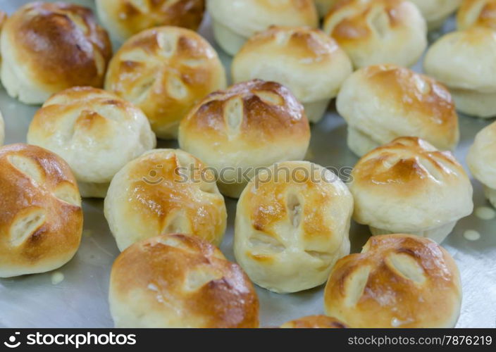 Tasty buns . Tasty buns on oven-tray
