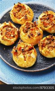 Tasty buns with filling of mix nuts, an autumn recipe.. Delicious homemade cakes, buns