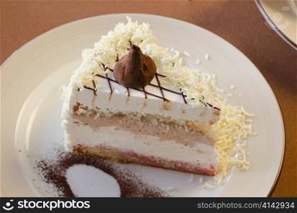 tasty cake at plate closeup