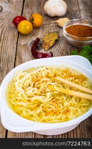 Tasty Chicken Soup with Chinese Noodles. Studio Photo. Tasty Chicken Soup with Chinese Noodles