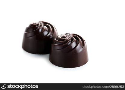 Tasty chocolates isolated on white