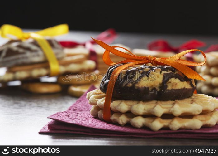 Tasty cookies. Close up of cookies and wafers on table