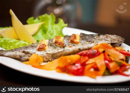 Tasty dish of rainbow trout fish with vegetables. rainbow trout fish