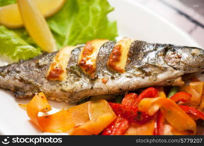 Tasty dish of rainbow trout fish with vegetables. rainbow trout fish