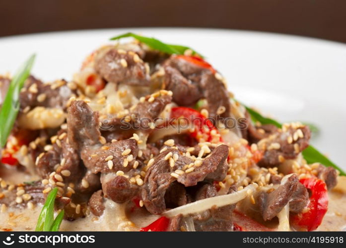 tasty dish of sliced beef roasted with vegetables