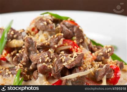 tasty dish of sliced beef roasted with vegetables