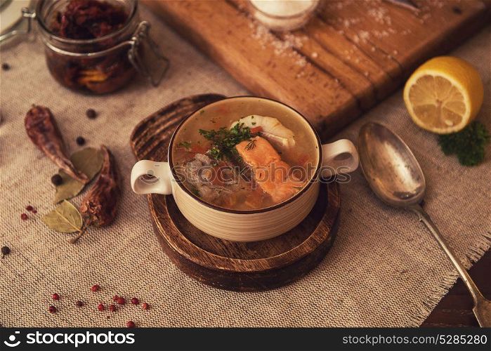 Tasty fish soup - ukha, soup from different fishes and vegetables. fish soup composition