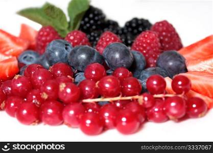tasty, fresh, bright, ripe wild and garden berries closeup