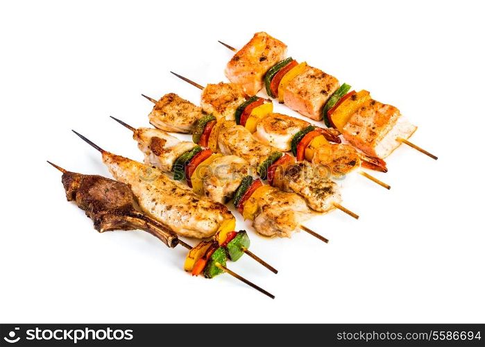 Tasty grilled meat on a white background, shish kebab